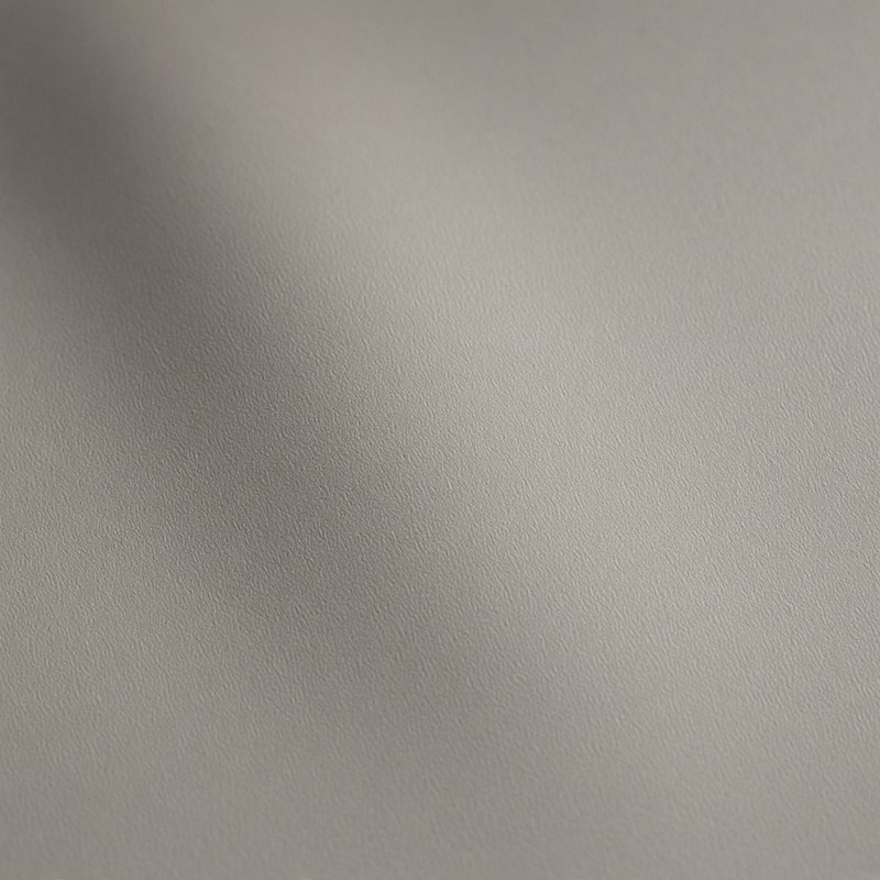 Close-up of a matte warm-grey laminate surface
